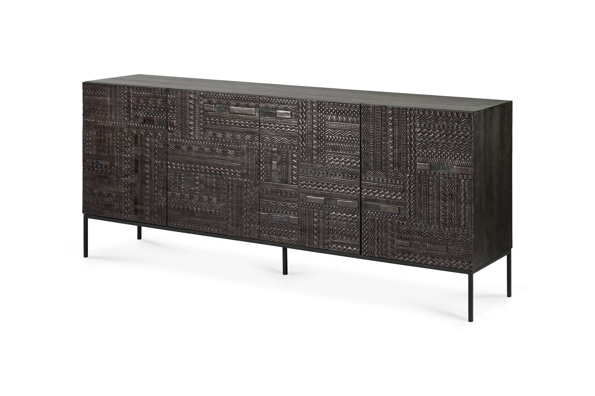 Ethnicraft Tabwa carved wood sideboard with geometric detailing and slim black metal legs, featured as premium designer furniture Auckland.