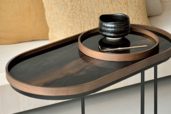 Oval black and bronze decorative tray table with matching round tray from Cuchi NZ, modern furniture Auckland and luxury home accessories