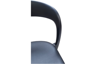 Detail view of a modern black chair showing its curved backrest and contoured seat, designed for ergonomic support and sleek aesthetics.