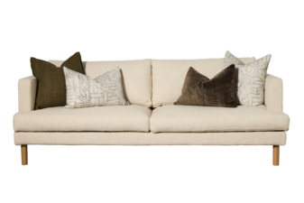 Cuchi Sketch Montego three seater sofa with decorative cushions and timber legs